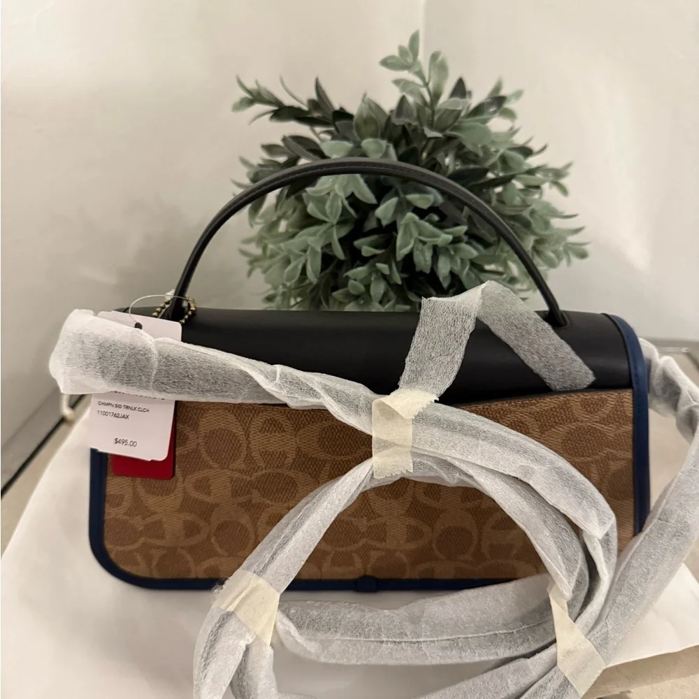 Coach X Champion Turnlock Clutch In Signature Canvas